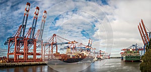 Germany Hamburg Burchardkai With Blue Cloudy Sky In Background