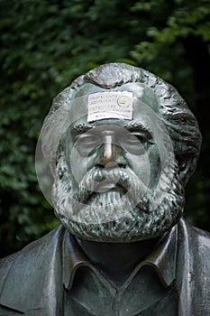 Germany Monument of Marx in Berlin with the message: propaganda covers totalitarian structures