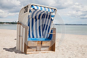 Germany, Schleswig-Holstein, Baltic Sea, beach chair at beach photo