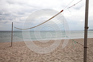 Germany, Schleswig-Holstein, Baltic Sea, volleyball net on beach
