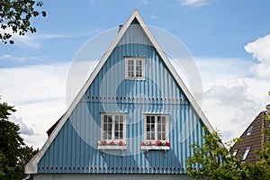 Germany, Schleswig-Holstein, House, blue facade, gable photo