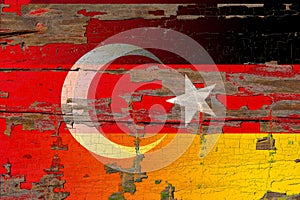 Germany and Turkey flag on old wood.