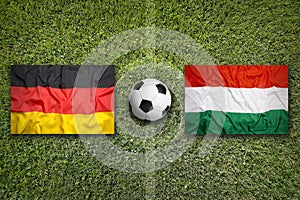 Germany vs. Hungary flags on soccer field