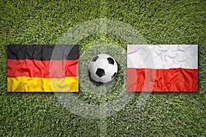 Germany vs. Poland flags on soccer field