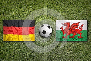 Germany vs. Wales flags on soccer field