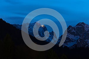 Germanys highest mountain zugspitze with the zugspitze building station in the evening