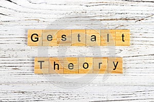 gestalt theory word made with wooden blocks concept