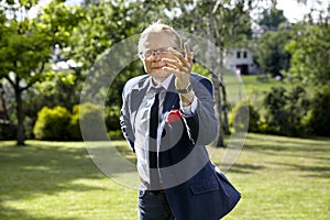 Gesticulate man in the garden