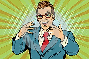 Gesticulating joyful businessman with glasses photo