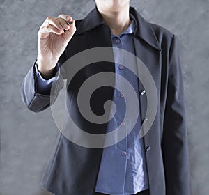 gesture of businessman hand holding pen writing something