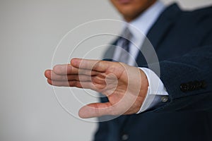 Gesture male hand rejection says no male businessman in a suit