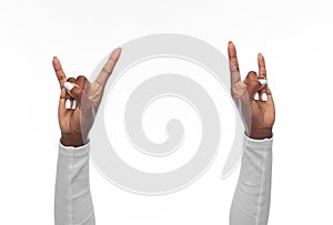 hands of african american woman showing rock sign