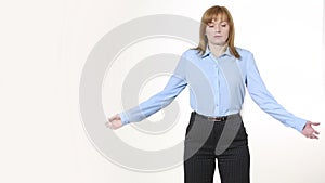 Gesture Shrug. girl in pants and blous. Isolated on white background. body language. women gestures. nonverbal cues