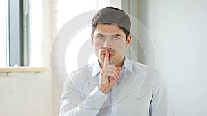 Gesture of Silence by Man in Office, Shut Your Mouth