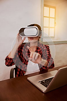 Gesturing young lady with 3d viewer