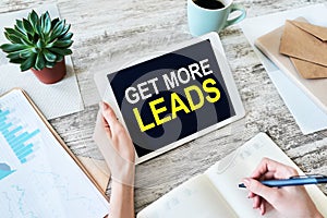 Get more leads banner. Digital marketing and sales increase concept on device screen. photo