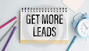 Get More Leads text as memo on notebook