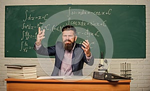 Get out of class. School principal threatening with punishment. Teacher strict serious bearded man chalkboard background