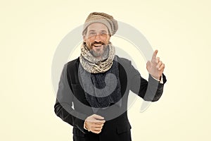 Get ready for frosty days. Mature fashion model enjoy cold weather. Bearded man accessorizing outfit with scarf. Winter