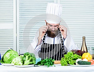 Get ready. Man bearded chef getting ready cooking delicious dish. Chef at work starting shift. Guy in professional