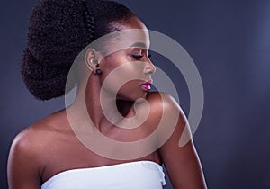 Get in touch with your inner beauty too. Studio shot of a beautiful young woman posing against a black background.