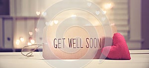 Get well soon message with a red heart