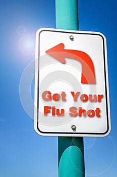 Get Your Flu Shot. Conceptual Sign against Blue Sky
