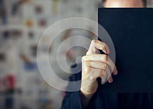 Getting information. Reading folder, folder on the chair.