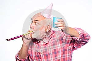 Getting older is still fun. Elderly people. Man bearded grandpa with birthday cap and drink cup. Birthday crazy party