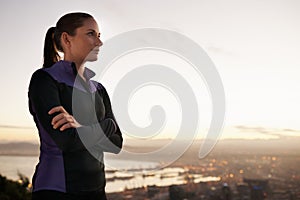 Getting psyched for her run. Shot a beautiful young woman training outdoors.