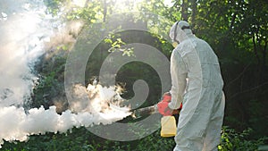 getting rid of ticks uses a mosquito fumigator to destroy the Zika virus and Dengue fever tick insect