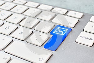Getting or sending a mail message concept with computer keyboard and e-mail button