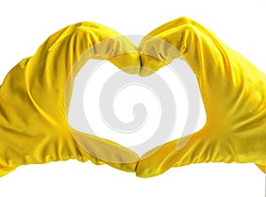 Getting started cleaning. Yellow rubber gloves for cleaning on white background .General or regular cleanup.