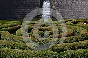 The Getty Museum is the largest art museum in California amazing circles of bushes decorate the pond where the waterfall