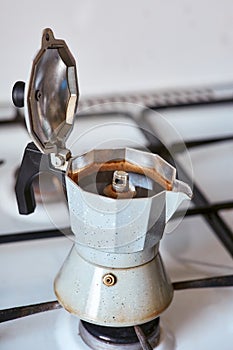 geyser coffee maker on a gas stove