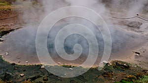 geyser in Iceland. fumarole geothermal area in Iceland. geothermal iceland geyser. steam comes from geothermal geyser in