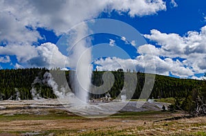 Geyser Old Faithful erupts in Yellowstone National Park in Wyoming, US