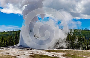 Geyser Old Faithful erupts in Yellowstone National Park in Wyoming, US