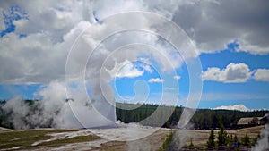 Geyser Old Faithful erupts in Yellowstone National Park in Wyoming, USA