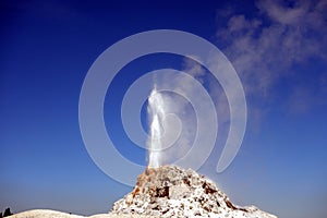 A geyser shooting steam into the air