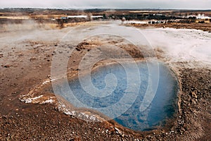 Geyser Valley in the southwest of Iceland. The famous tourist attraction Geysir. Geothermal zone Haukadalur. Strokkur