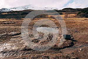 Geyser Valley in the southwest of Iceland. The famous tourist attraction Geysir. Geothermal zone Haukadalur. Strokkur