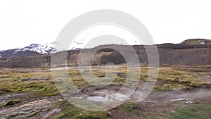 Geyser Valley in the southwest of Iceland. The famous tourist attraction Geysir. Geothermal zone Haukadalur. Strokkur