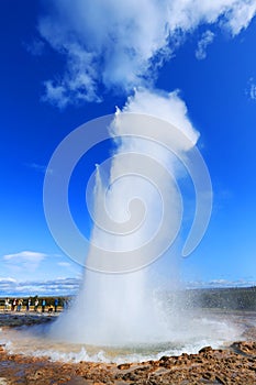 GEYSIR, ICELAND, 14 SEPTEMBER, 2019 : Erupting of the geysir. Tourists visiting the famous Geysir area