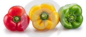 GGreen, yellow and red sweet peppers on white background. File contains clipping path