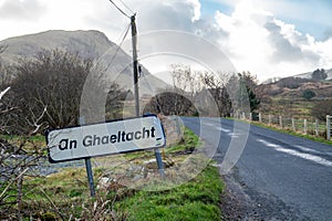 An Ghaeltacht road sign explaining that here starts an area where the irish language is spoken - Translation: Irish