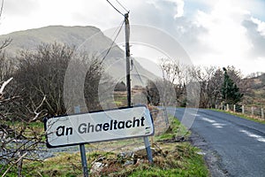 An Ghaeltacht road sign explaining that here starts an area where the irish language is spoken - Translation: Irish