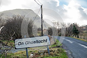 An Ghaeltacht road sign explaining that here starts an area where the irish language is spoken - Translation: Irish