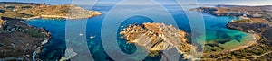 Ghajn Tuffieha, Malta - Aerial panoramic view of the coast of Ghajn Tuffieha with Gnejna Bay photo