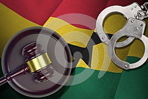 Ghana flag with judge mallet and handcuffs in dark room. Concept of criminal and punishment, background for judgement